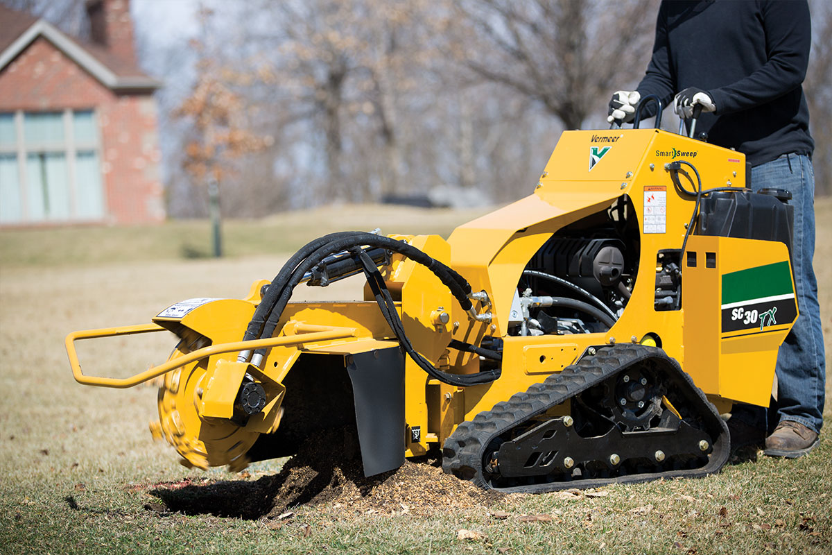 Stump grinding machine in use